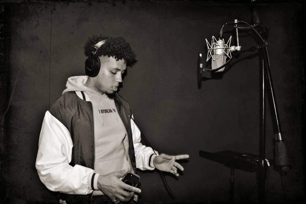 Rapper in a recording booth